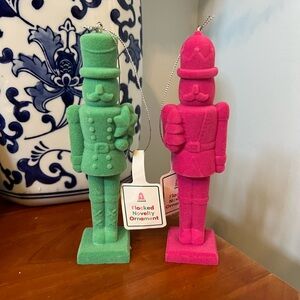 Pink and green flocked nutcracker ornaments